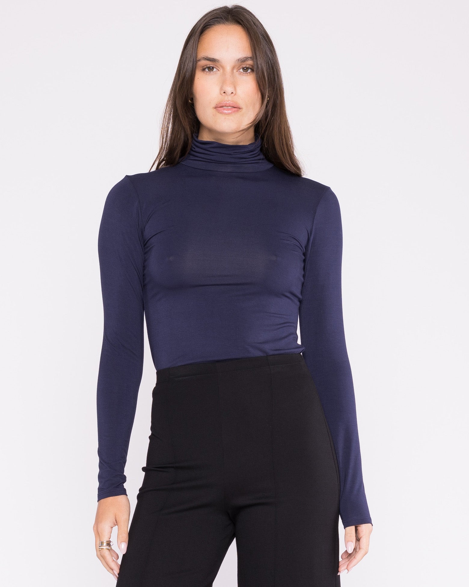 Navy blue turtleneck Fitted top. This beautiful orders top is comfortable and soft. Great for a fall day.